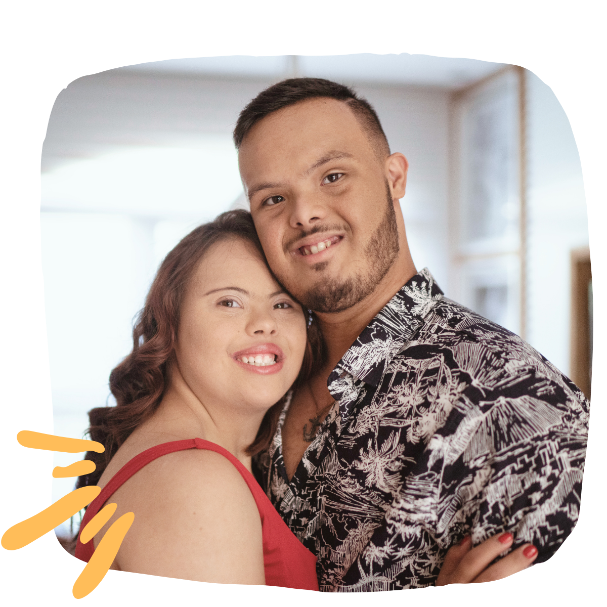 A smiling couple embracing, representing connection, autonomy, and support