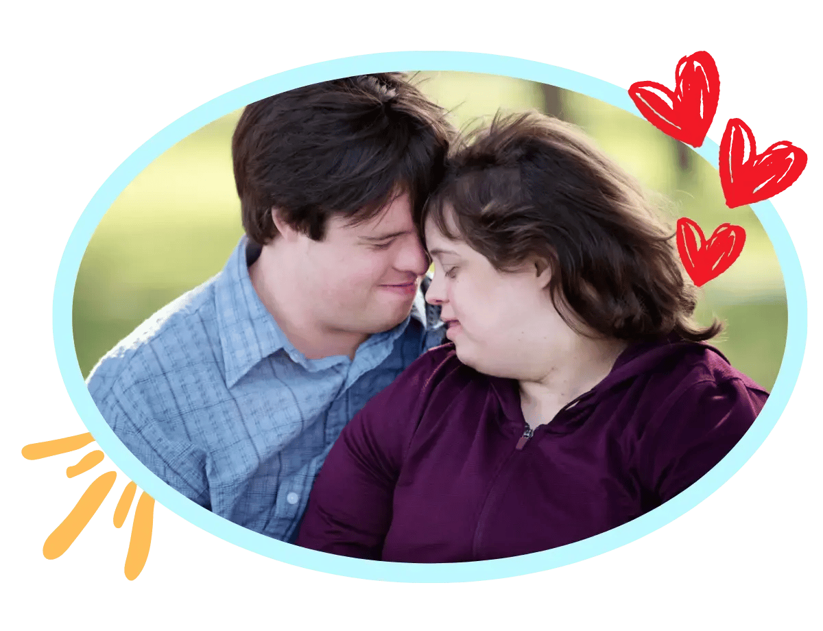 A young couple both with Down Syndrome leaning toward each other